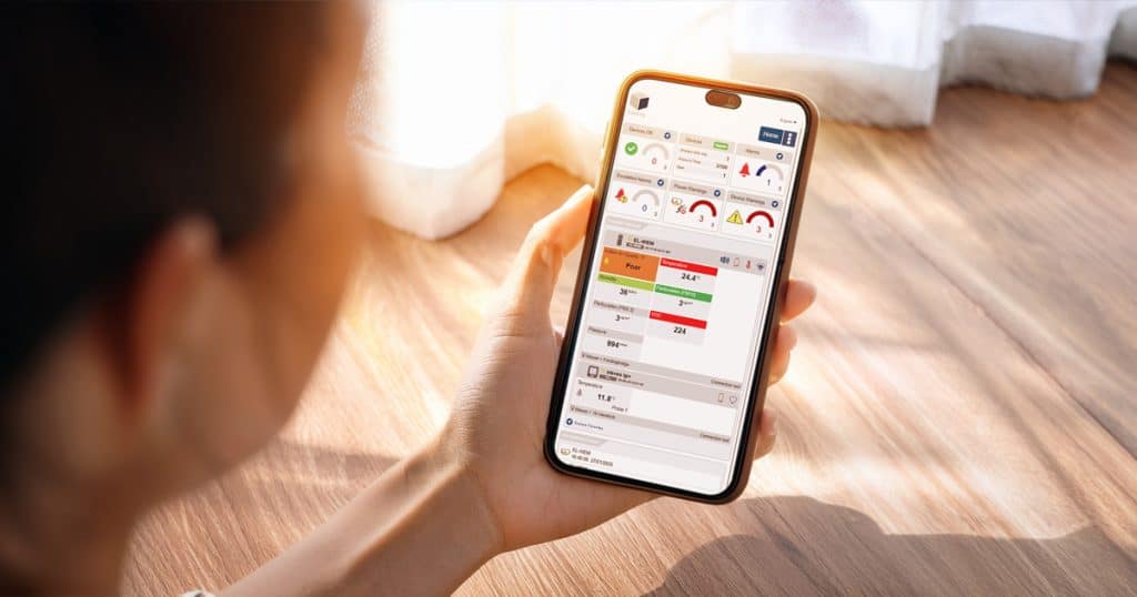 person looking at phone with EasyLog Cloud app